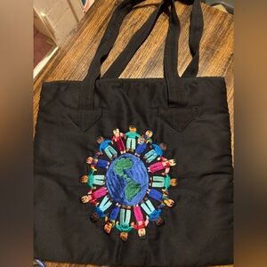 Ruth Nohemi Black Embroidered Children of the World Tote Bag.